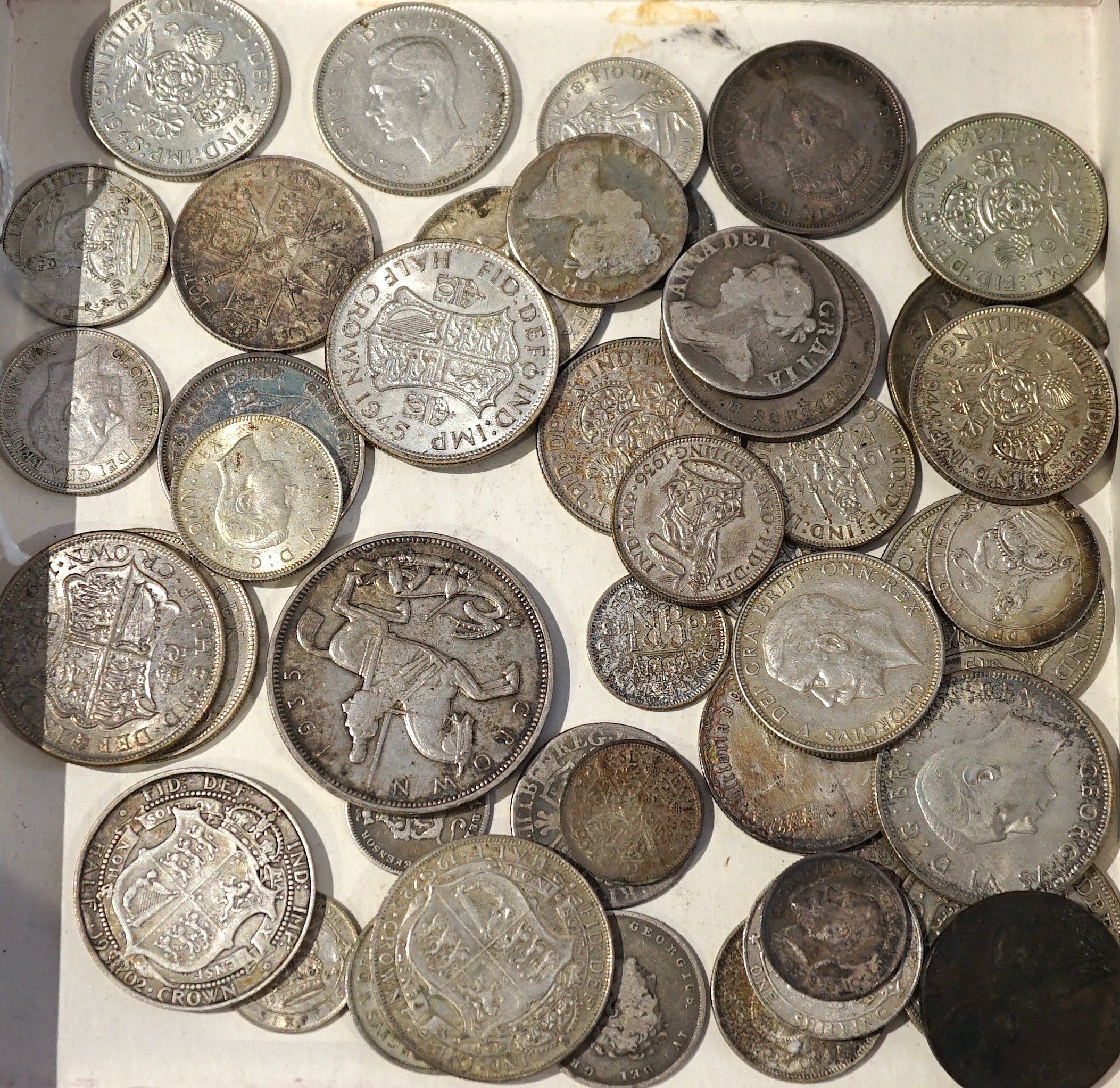 British silver coins, Anne to George VI, highlights include 1935 crown, two Anne shillings, various halfcrowns, florins and shillings and threepence coins, many VF or better, together with a George III 1775 Halfpenny, Ge